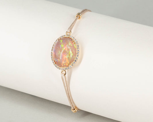 Armband in 18 kt Roségold mit Opal und Brillanten