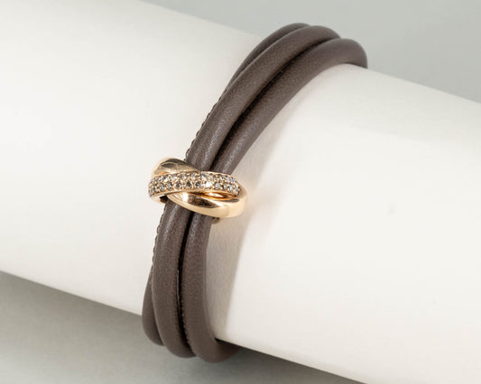 Lederarmband mit braunen Brillanten in 18 kt Roségoldfassung